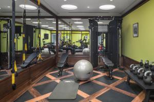 a gym with a lot of treadmills and exercise equipment at El Llorenc Parc de la Mar - Adults Only (+16) in Palma de Mallorca