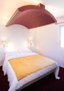 Postel nebo postele na pokoji v ubytování Villa Des Dunes