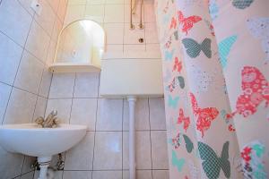 Kúpeľňa v ubytovaní Apartment Milana