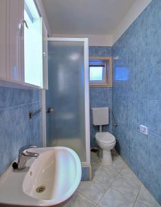 Kúpeľňa v ubytovaní Apartment Milana