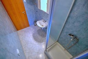 Kúpeľňa v ubytovaní Apartment Milana