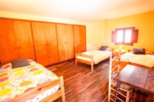 Posteľ alebo postele v izbe v ubytovaní La Rovirota, Casa Solar