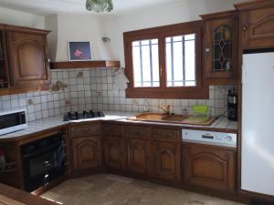 Dapur atau dapur kecil di Villa Aimé