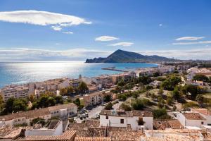 an aerial view of a city and the ocean at Casa Trinitat in Altea