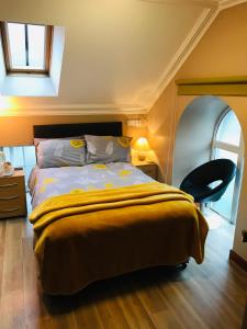 Säng eller sängar i ett rum på Pisgah Guesthouse