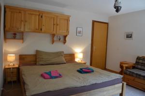 Postel nebo postele na pokoji v ubytování Immeuble Panorama + 10 fotografií