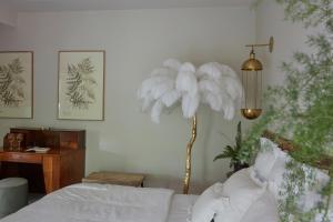 Cama ou camas em um quarto em Hôtel Domaine de Raba Bordeaux Sud