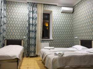 Katil atau katil-katil dalam bilik di HOTEL JULIA Akhaltsikhe