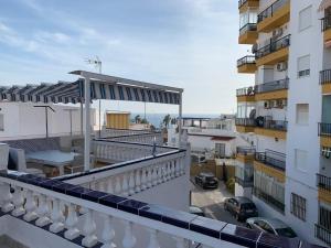 A balcony or terrace at CASA TORRECILLA LINDA Adosado 2 Dormitorios a 50 metros de la Playa Torrecilla Nerja