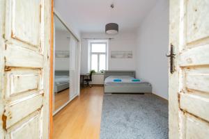 Tempat tidur dalam kamar di Apartment - OLD TOWN - Cyrulicza