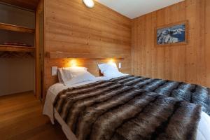 Postel nebo postele na pokoji v ubytování Balcons du Bettex