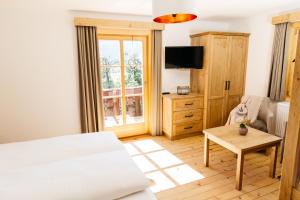 Postel nebo postele na pokoji v ubytování Ferienhaus Bognerhof
