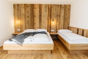 Postel nebo postele na pokoji v ubytování Ferienhaus Bognerhof