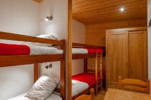 Postel nebo postele na pokoji v ubytování Balcons du Bettex