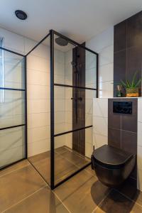 Bilik mandi di Vakantiewoning De Koekoek