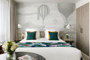 Citadines Confluent Nantes客房内的一张或多张床位