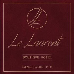 um livro com o nome de le lanvent e aigil em Le Laurent Boutique Hotel - Adult Only em Arraial d'Ajuda