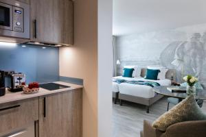 Citadines Confluent Nantes的厨房或小厨房