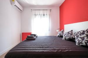 Ein Bett oder Betten in einem Zimmer der Unterkunft Ever House - ALCALA DIVA 1 ROOFTOP