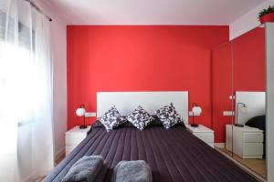 Ein Bett oder Betten in einem Zimmer der Unterkunft Ever House - ALCALA DIVA 1 ROOFTOP