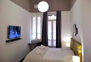 TV/trung tâm giải trí tại Casa Italiano - BestBnB Garbatella