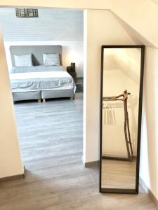 Postel nebo postele na pokoji v ubytování Gîte d'Anthisnes