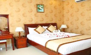 Postel nebo postele na pokoji v ubytování Corvin Hotel
