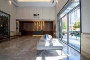 Posezení v ubytování ZUR Studios and Suites