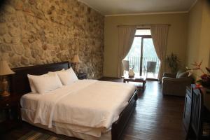 Cama o camas de una habitación en Los Mandarinos Boutique Hotel & Spa