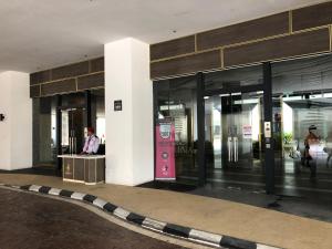 a lobby of a building with a pink vending machine at LEGOLAND - 1-8 Pax Lego themed house with Superhero, Pirates & Forest at Puteri Harbour in Johor Bahru