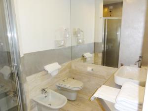 Koupelna v ubytování Hotel Excelsior