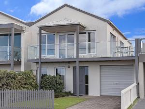 a large white house with a lot of windows at Blue Vista in Port Fairy