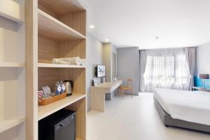 Xen Hotel Nakhon Pathom - SHA PLUS客房内的一张或多张床位