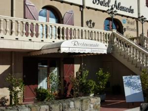 a building with a balcony on the side of it at Hotel Alameda in Zarautz