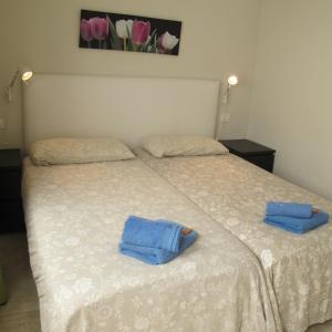 En eller flere senge i et værelse på Little Venice Apartment in Puerto de Mogan