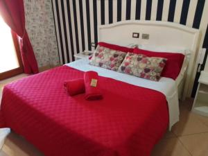 A bed or beds in a room at Hotel Tiffany