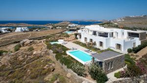 an aerial view of a house with a swimming pool at ABSOLUTE PARADISE in Paradise Beach