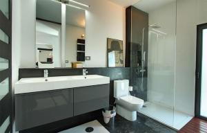 a bathroom with a sink and a toilet and a shower at Casa Mamita in Los Llanos de Aridane +22 photos