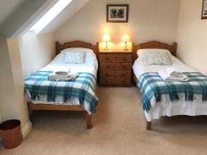 Ένα ή περισσότερα κρεβάτια σε δωμάτιο στο Crowthorne, Bookham Court