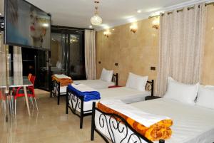 Postel nebo postele na pokoji v ubytování Résidence Miramare Marrakech + 37 fotografií