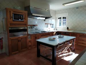 Η κουζίνα ή μικρή κουζίνα στο FINCA EL PIRUETANO +16 φωτογραφίες