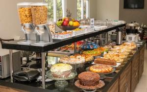 Opções de café da manhã disponíveis para hóspedes em Hotel Tainá - Aeroporto Cuiabá