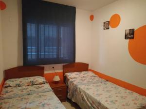 Postel nebo postele na pokoji v ubytování Apartamento 1ª línea de playa VT-35658-CS