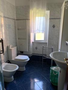 Kylpyhuone majoituspaikassa Resort Villa Rosa Maria