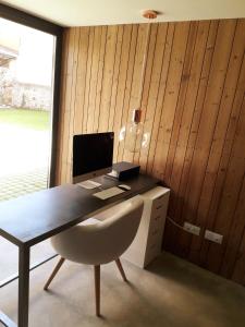 TV a/nebo společenská místnost v ubytování Hotel EN