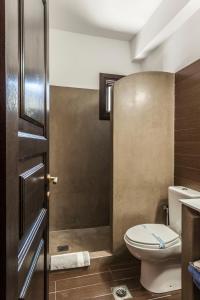 A bathroom at Poseidon Hotel