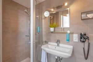 Koupelna v ubytování Hotel Strandschlösschen