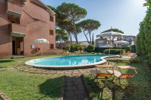 Bazén v ubytování Ricci Hotel - Marina di Grosseto nebo v jeho okolí