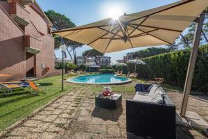 Bazén v ubytování Ricci Hotel - Marina di Grosseto nebo v jeho okolí