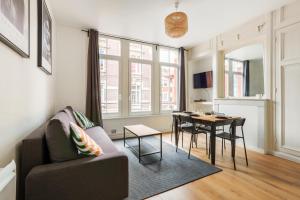 Χώρος καθιστικού στο Cosy appartement proche gares #2